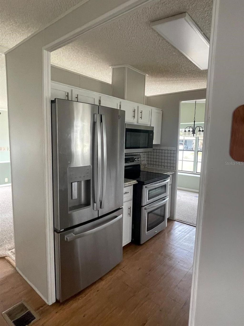 Photo of 2839 Manatee Rd, Tavares, FL 32778 (MLS # S5144788)