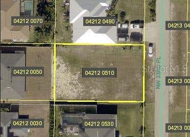 Photo of 1008 NW 33rd Place, Cape Coral, FL 33993 (MLS # OM730736)