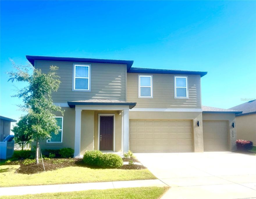MOTIVATED SELLER*** SELLER OFFERING $10,000 TOWARD BUYERS CLOSING COSTS WITH AN ACCEPTED OFFER*** SELLER WILLING TO CONSIDER COMPETEING WITH BUILDER INCENTIVES*** This 2022 Ashton Woods Teton model delivers 2,700+ sq. ft. of living space on a premium lot with panoramic hillside views. The home features 9’ ceilings, luxury vinyl plank flooring, and a chef-inspired kitchen complete with a massive pantry, upgraded fixtures, and quartz counters. The versatile floor plan includes five bedrooms—including a convenient main-floor guest suite—plus a dedicated office and an expansive upstairs loft. Retreat to a primary suite with frameless shower and designer tile work, or head outdoors to an oversized fenced backyard ideal for a future pool. The Minneola Hills community is right on the bike trail with access to the Lake Apopka Trail for endless outdoor riding and wildlife viewing. Luxury amenity center featuring dual swimming pools, a fitness center, pickleball and basketball courts, and a dog park. Residents also enjoy unmatched convenience near the new AdventHealth campus and the 2025-opened Minneola Horizon Academy (K–8). With the Florida Turnpike nearby, you are perfectly positioned for a quick commute to Clermont, Winter Garden, Universal and Disney, all while being steps away from the upcoming 96-acre Minneola City Center's retail and dining hub. Fantastic place to call home or as an ideal investment opportunity. Tour today!