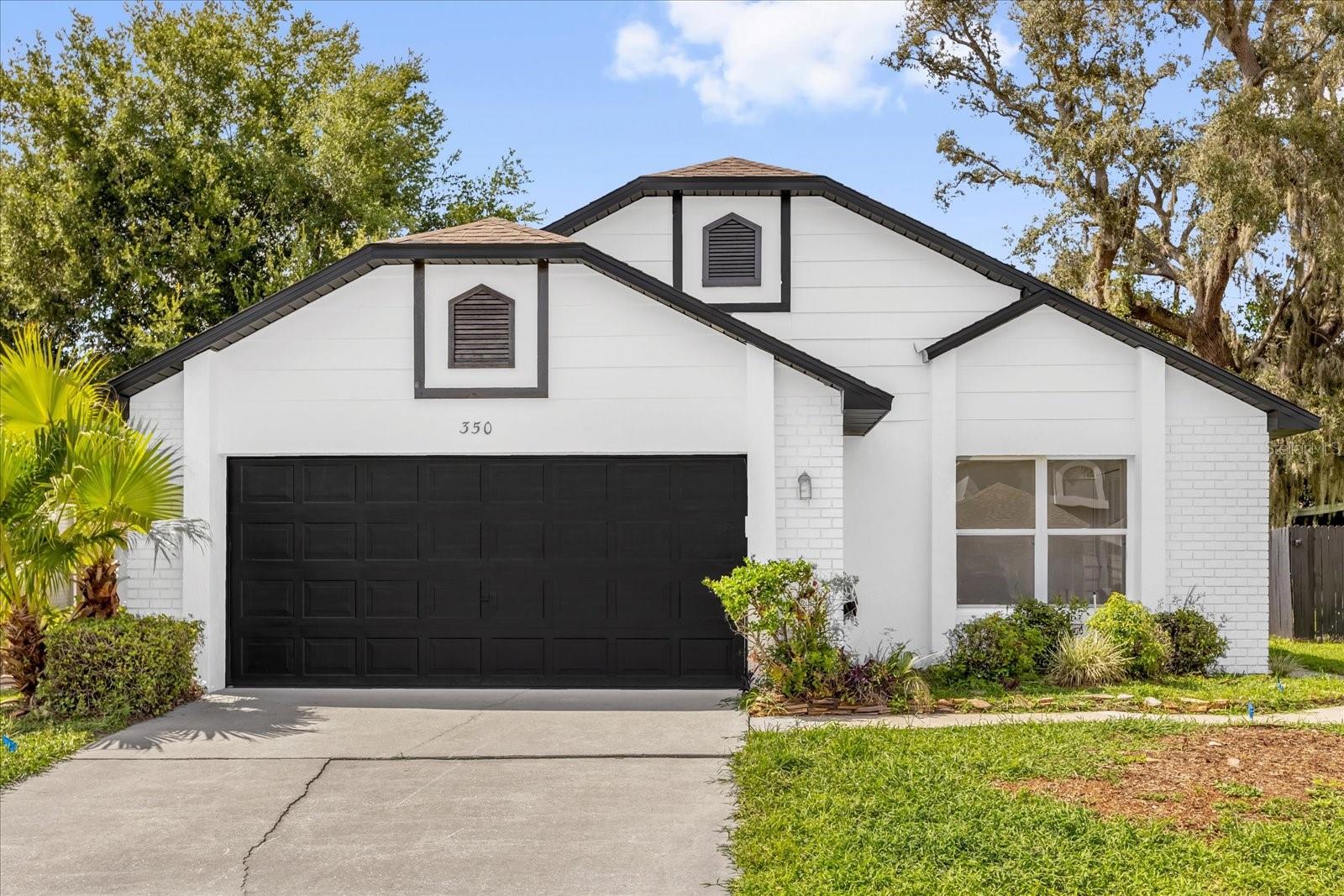 This fully remodeled 3-bedroom, 2-bath home is a showstopper. From the striking front door to the open, light-filled layout, every detail has been designed to impress. Enjoy luxury vinyl plank flooring in white-oak, a sleek new kitchen with quartz countertops, white-shaker cabinets, and a designer backsplash as well brand new appliances.
The spacious primary suite boasts a large walk-in closet and spa-like shower. The two additional bedrooms are generously sized and share a modern, tastefully designed bathroom. Convenient in-home laundry, abundant natural light, and stylish finishes throughout add to the appeal.
This home also offers a spacious 2-car garage with pristine epoxy floors completes this modern gem. Plus, it’s zoned for highly desirable Lake Mary schools. Fresh, elegant, and move-in ready—this is the home you’ve been waiting for! Call now for your private showing, this home won't last!