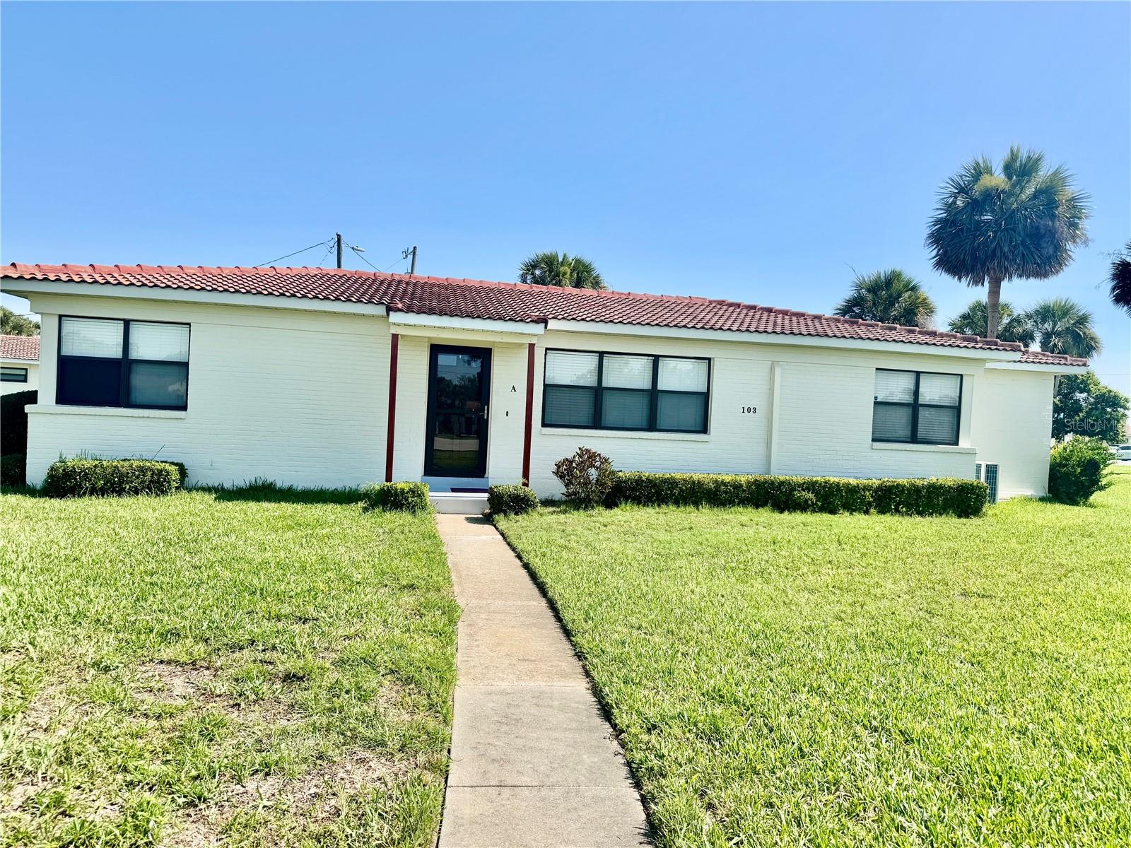 Recently updated and freshly painted, this spacious 2-bedroom, 1-bath home offers comfortable beachside living just 2 blocks from the ocean. The large master bedroom, oversized living room, and a fully enclosed glass and screened bonus room perfect as a second living area or sunroom provide ample space and flexibility. Enjoy a dine-in kitchen with brand-new cabinets, countertops, and appliances, plus an in-unit washer and dryer for added convenience. The home also features four large closets, a private outdoor patio, and two assigned parking spots. Located in a well-maintained community with access to a swimming pool and tennis court, and just minutes from shopping, dining, and entertainment.