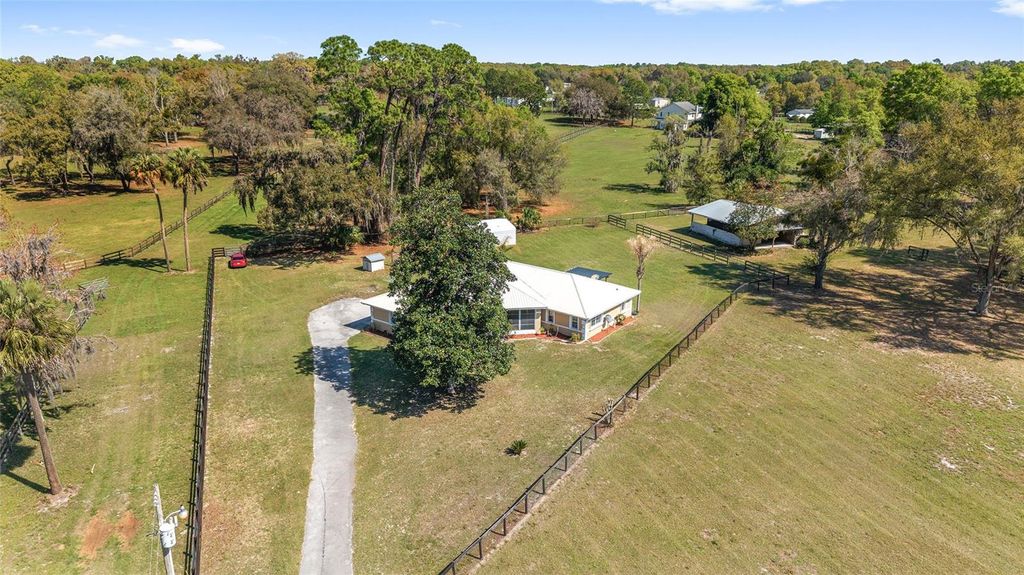 Photo of 205 E Hwy 318, Citra, FL 32113 (MLS # OM720755)
