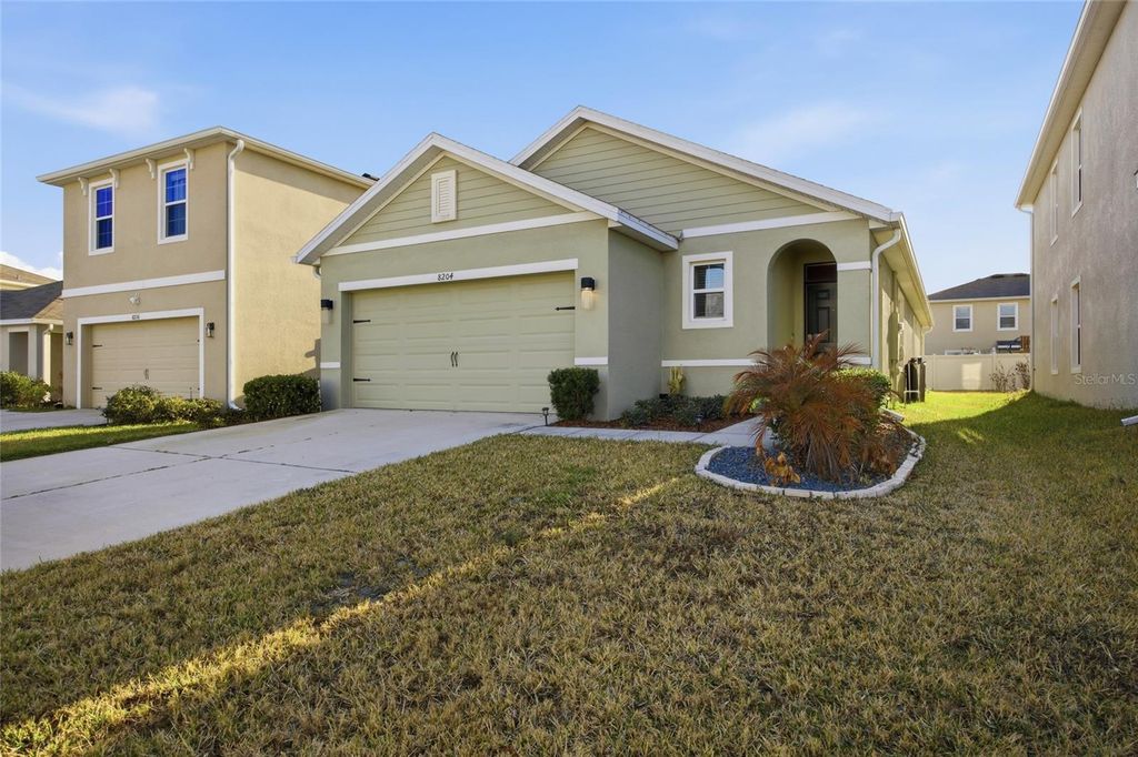 Photo of 8204 Pelican Reed Circle, Wesley Chapel, FL 33545 (MLS # TB8473827)