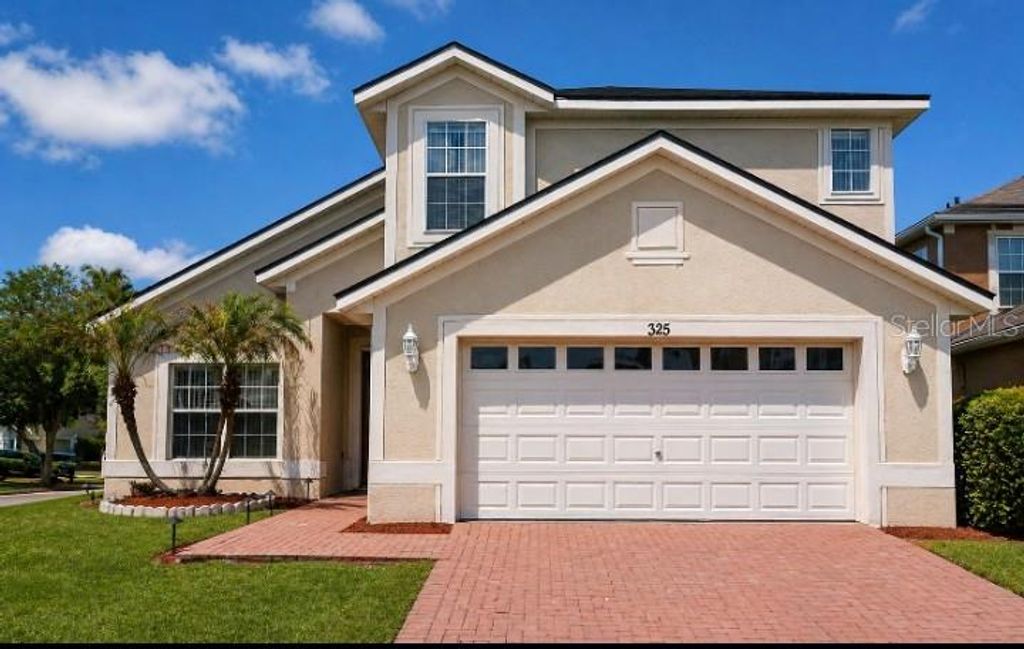 Photo of 325 Weatherby Pl, Haines City, FL 33844 (MLS # S5148860)
