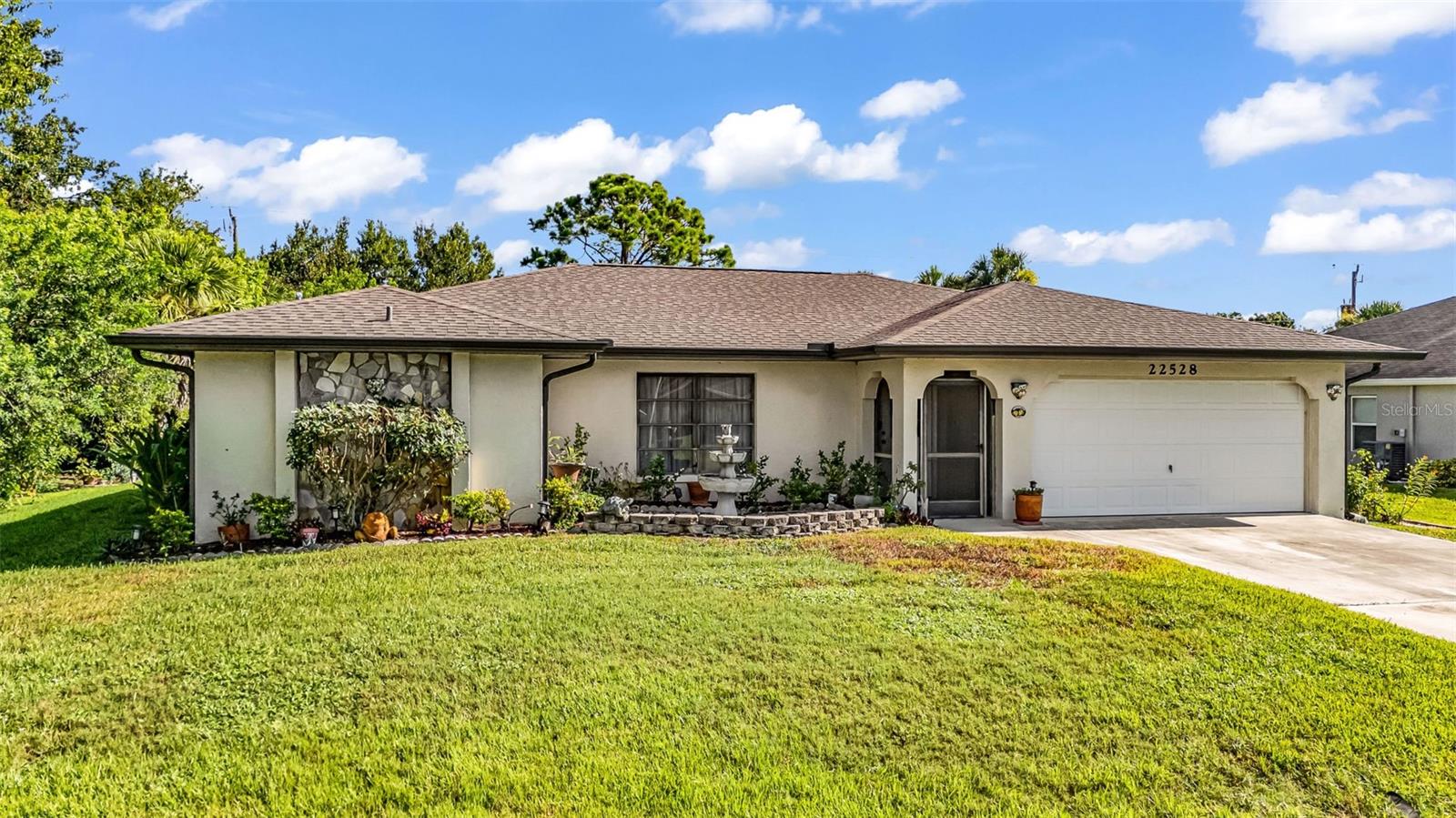 Live your Florida dream in this beautifully renovated 2-Bedroom, 2-Bath home in Port Charlotte!
Welcome to your slice of paradise, located in an established neighborhood, this lovingly maintained and beautifully updated two-bedroom, two bath home combines comfort, style, and the charm of living in the sunshine state—all just minutes from shopping, dining, parks, beaches and so much more!
Step inside to discover a bright, open floor plan with tasteful renovations throughout. The stylish kitchen features updated cabinetry, sleek countertops, stainless-steel appliances, marble tile backsplash, a passthrough window and an area for barstools at the peninsula—perfect for whipping up quiet dinners at home or entertaining guests. The formal living and dining spaces are light and bright with large windows and sliders which exit out to the large rear porch. The family room includes a dinette area for a quick meal and also has sliders which exits out to the porch area. Vaulted ceilings and the open space layout overlooking the kitchen make this a room in which you want to spend all kinds of time in watching TV, reading or just hanging out. The large primary bedroom offers the homeowner a place to retreat in privacy with its ensuite bathroom, double closet and sliding glass door access to the porch. Both bathrooms have been stylishly remodeled in consistent materials to the rest of the home’s contemporary finishes, offering a home which is well thought out and welcoming. All the floors in the home have been replaced with a gorgeous engineered hardwood which add a feeling of warmth to the home. A spacious garage conversion adds versatile living space—ideal for a home office, guest suite, hobby room, or entertainment area. The possibilities are endless while still allowing for any new homeowner to easily convert the space to its original condition. Enjoy the outdoors year-round from your large covered porch, perfect for morning coffee, alfresco dining, or unwinding in the warm Florida evenings. The lush yard provides plenty of room for gardening or even a future pool. It is currently maintained with a sprinkler system and to the rear of the property is a garden shed, perfect for neatly storing away all of the lawn implements. Whether you’re looking for a full-time residence or a winter retreat, this home offers the ideal Florida lifestyle—sunshine, relaxation, and room to make it your own. With mature trees, no HOA, and a low-risk flood zone X, you’ll love the freedom and tranquility this home provides.