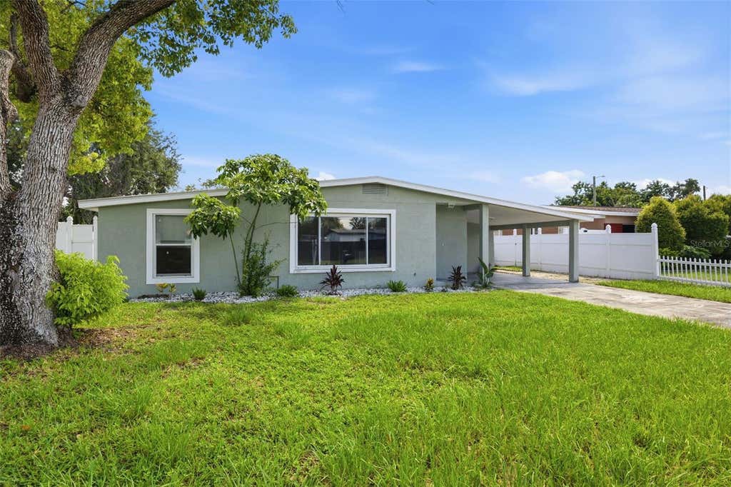 Photo of 7806 Tanglewood Lane, Tampa, FL 33615 (MLS # TB8543001)