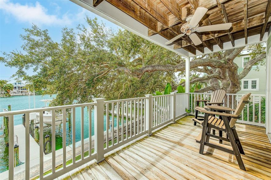 Beautiful Bayside Oaks in IRB, two bedroom, three bath, waterfront town home with a bonus room that could be a third bedroom, media room or office. Located in Indian Rocks Beach on Florida's Gulf Coast. Three waterside balconies, plus a rooftop deck that has views of the beach and bay, a perfect location to watch sunrise or sunset. Under building parking garage for two vehicles and a golf cart. This is an unfurnished, annual rental, application and credit check required. Sorry, no pets and no smoking. Call today for more information.
