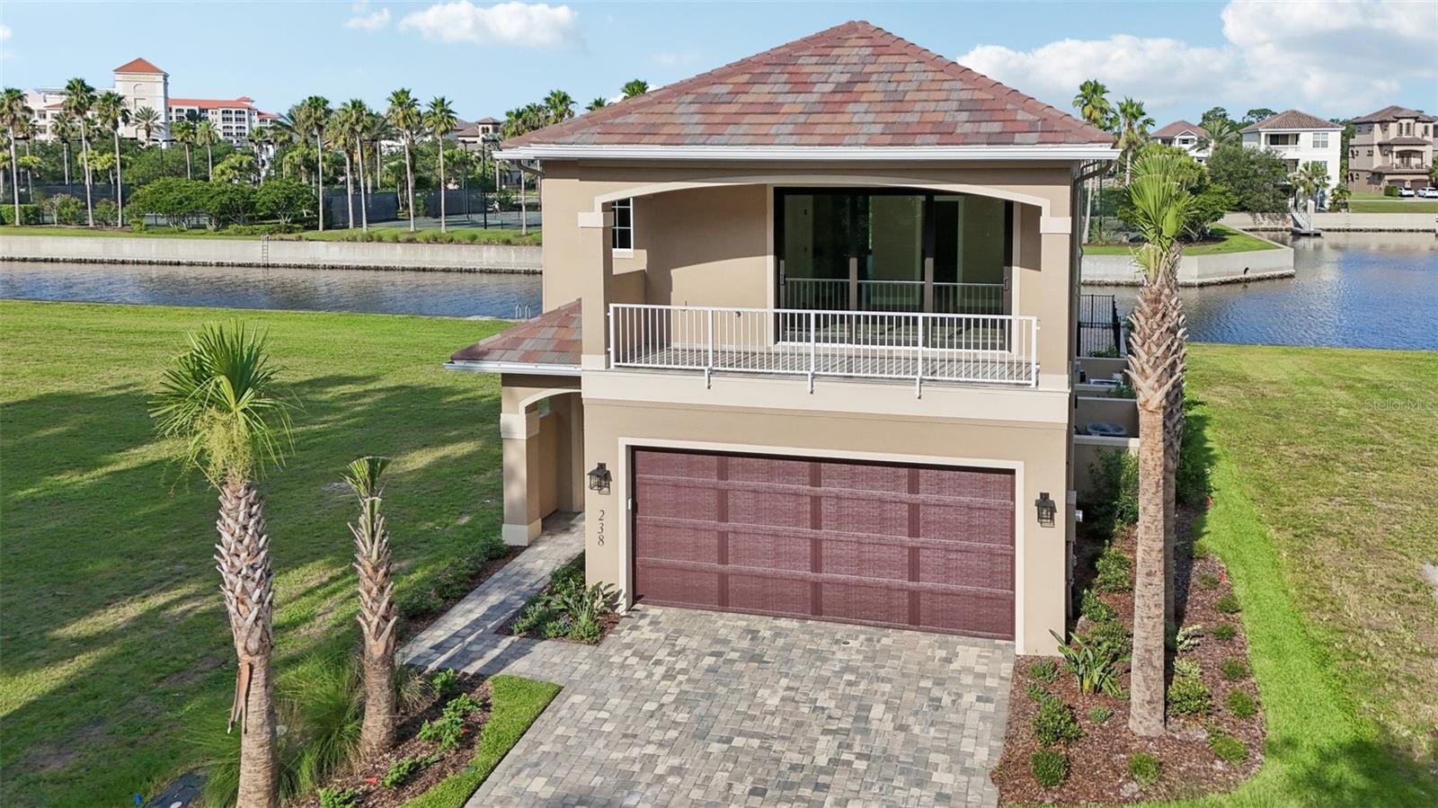 This brand new canal-front home was designed with purpose. Water views, a pool and hot tub, and two balconies give you space to catch your breath, coffee or cocktail in hand.
Inside, it's bright, open, and built for living. The kitchen centers the home with a large island, eat-in space, and room to move without bumping elbows. The primary suite is spacious, with a huge walk-in closet and a bathroom that includes a separate soaking tub built for long, quiet escapes.
Elevator-ready for when the time comes. Dock approved so you're ready when the boat is. Nothing overdone, nothing wasted just a well-built home that hits the mark.