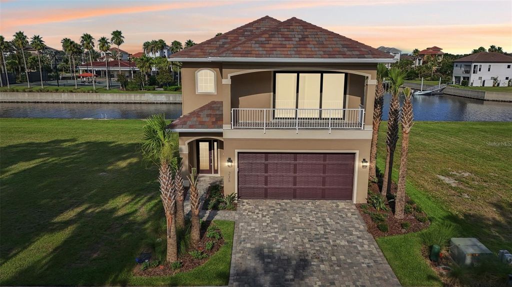 Photo of 238 Harbor Village Point N, Palm Coast, FL 32137 (MLS # FC311381)