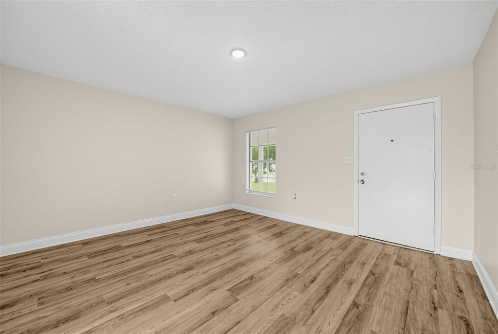 Photo of 5635 Stull Avenue, Orlando, FL 32810 (MLS # TB8545408)