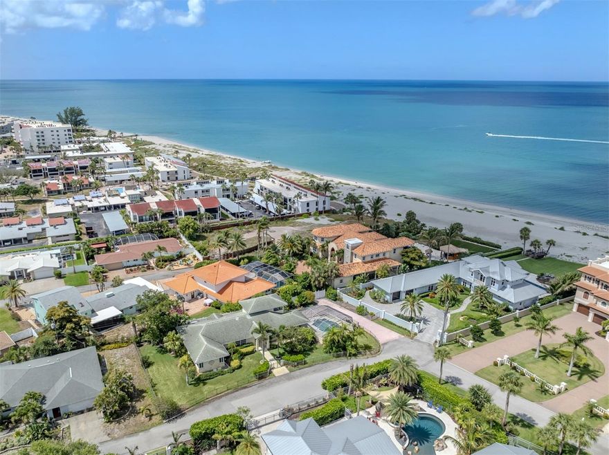 On the desired Island of Venice in the Gulf Manor neighborhood, this exceptional coastal property offers a rare opportunity to create the beach retreat of your dreams. In the desirable X Flood Zone and just one lot from the sandy shoreline and turquoise Gulf waters, the possibilities here are endless, so restore the existing residence or design and build a new luxury coastal estate. This three-bedroom, two-bath home features a spacious second-floor bonus room with a private balcony capturing beautiful Gulf views, creating the ideal setting for morning coffee or unforgettable sunsets. Outside, a large resort-style pool invites you to relax and enjoy the Florida lifestyle year-round. Residents of Gulf Manor enjoy deeded private beach access, offering an exclusive gateway to one of the area’s beautiful stretches of coastline. Beyond the beach, the home is ideally near the boutiques, dining, and entertainment district of historic downtown Venice. Spend your Saturdays strolling to the beloved local farmers market, enjoying outdoor cafes, live music and the charm that makes Venice Island so special. Whether you envision restoring its coastal character or building a custom waterfront-inspired masterpiece, this is an extraordinary chance to own in one of Venice Island’s sought-after beachside communities.