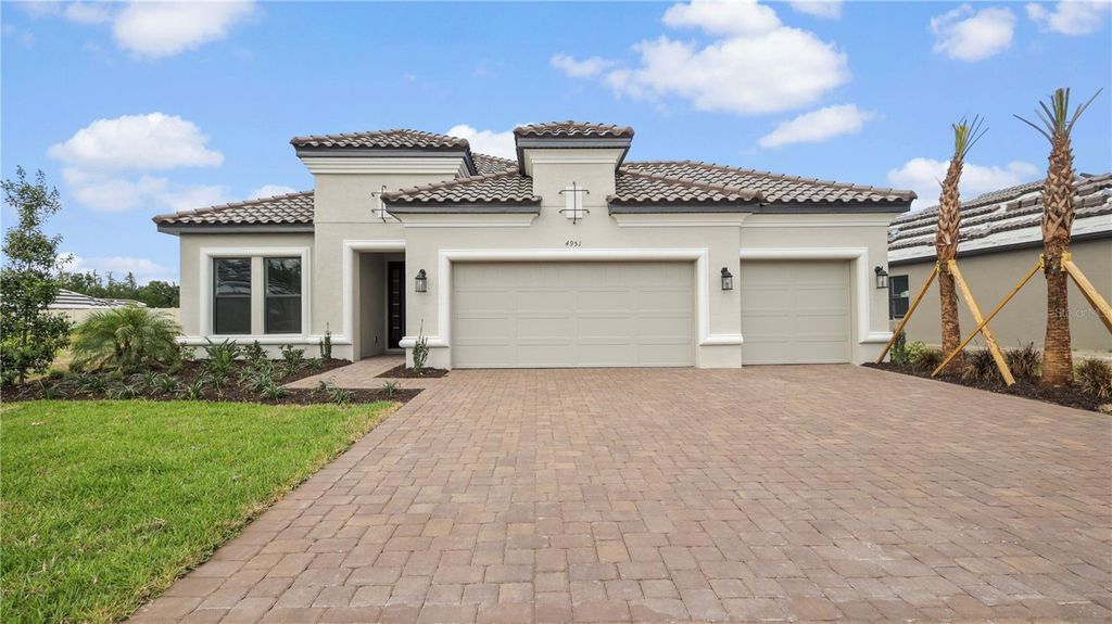 Photo of 4951 FRECCIA LOOP, WESLEY CHAPEL, FL 33543 (MLS # T3440229)
