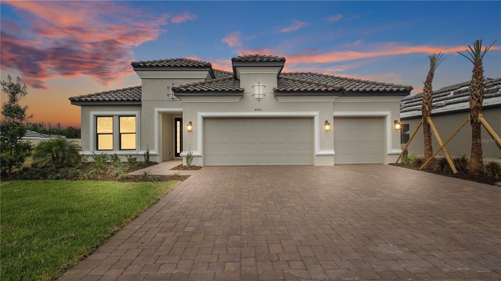 Photo of 4951 FRECCIA LOOP, WESLEY CHAPEL, FL 33543 (MLS # T3440229)