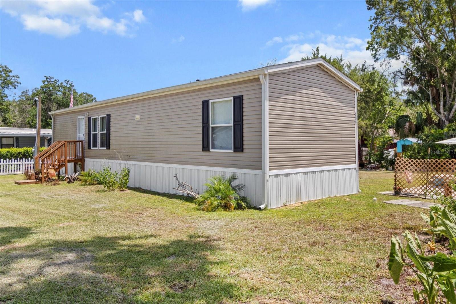 WATERFRONT!!! Move-in ready 2023 2-bedroom, 2-bath home located on a freshwater canal with direct access to the Withlacoochee River. BOAT RAMP IN YOUR BACKYARD!!! This home features a popular split floor plan, modern finishes, water conditioner, stainless steel appliances, fencing, large backyard, covered deck and energy-efficient construction. The property offers a spacious yard with room to relax or entertain, plus the freedom of no HOA and no age restrictions. Located on Florida’s Nature Coast, you’re minutes from downtown Inverness, local parks, public boat ramps, and the scenic Withlacoochee State Trail for biking and hiking. A fantastic opportunity to enjoy Florida living surrounded by nature and water access!