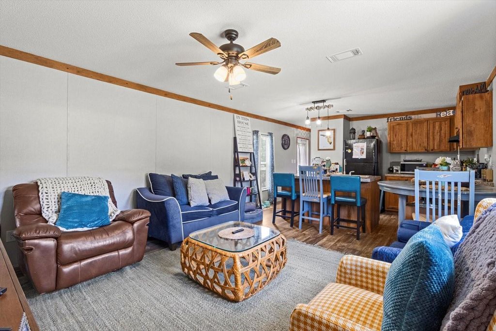 Photo of 609 S Redbud Terrace, Inverness, FL 34450 (MLS # OM704730)