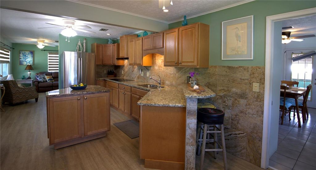 Photo of 113 Colonia Lane W, Nokomis, FL 34275 (MLS # A4665224)