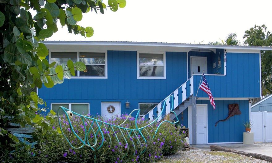 Significant Price Adjustment - MOTIVATED SELLER. Coastal Living at its Finest – West of the Trail, Nokomis. Thoughtfully redesigned and fully renovated, this 4 bed, 2 bath property Boasts two completely separated 2 bed/1 bath living areas, perfect for hosting and allowing privacy for guests or. extended family. Inside, you’ll find a modern, thoughtful layout with premium finishes and timeless design elements throughout. The inviting screened porch captures a charming "peek-a-boo" view of the water!  While outdoors you will find an expansive fenced yard, with multiple lounging spaces creating the ideal setting for year-round entertaining. The expansive 12 X 24 shed offers ample room for storage or transform it into a workshop. 

Enhanced with premium solar technology, the home delivers both luxury and efficiency, significantly reducing electric costs. Located just minutes from pristine Gulf beaches, walking-distance to waterfront dining and art galleries and surrounded by top-rated schools, this home embodies the best of Florida’s coastal living. Buyers brokers welcome.