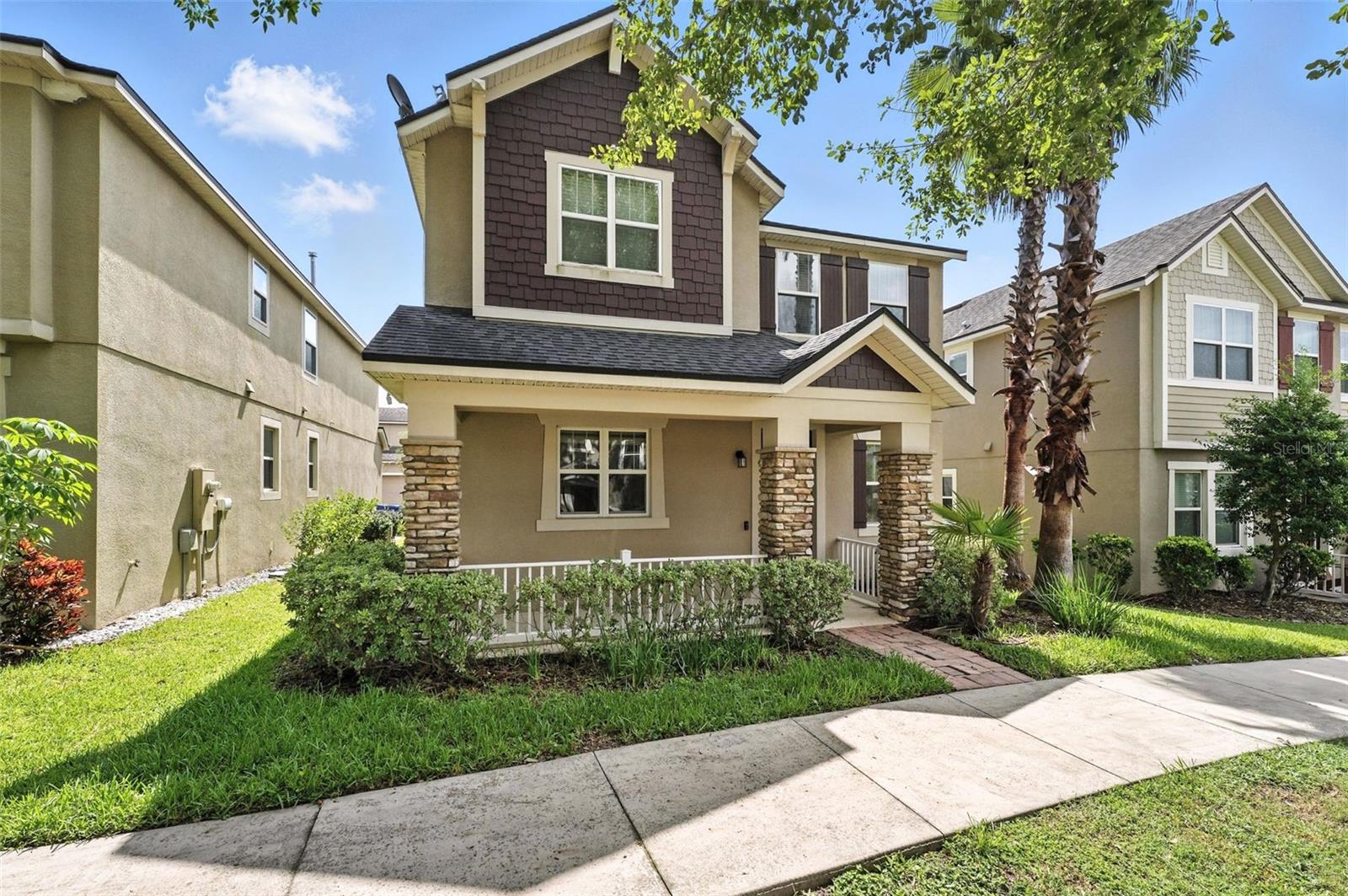 Discover an incredible opportunity to own an affordable, move-in-ready home in the desirable Winter Garden/Ocoee area, with quick access to major roadways like 408 and 429 for effortless commuting. Built in 2017, Coventry Craftsman model by Mattamy Homes is located in the gated community of Spring Lake Reserve, featuring a community pool and playground for residents to enjoy. This beautifully upgraded 3 Bedroom, 2.5 Bathroom home offers a charming park and garden view, enhanced by a welcoming covered front porch with natural stone accents. Inside, the open-concept first floor features all-tile flooring, high ceilings, and large gathering spaces perfect for entertaining. The modern kitchen boasts granite countertops, an oversized island, stainless steel appliances, a NATURAL GAS range, and generous natural lighting through the kitchen window. A convenient half bath as well as a USB charging station complete the downstairs area. Step outside to the covered back patio, a perfect place to start your day with that cup of coffee in hand while scrolling your emails and socials or catching up with friends and family for weekend BBQ’s. Upstairs, the Loft space offers a flex area that could be utilized as child’s playroom, home office, or additional entertainment area. The spacious primary suite features high ceilings, garden views, and en-suite bath with a garden tub, separate walk in shower, double sinks, and an oversized walk-in closet. Two additional bedrooms, one with its own walk-in closet, share a second full bath with a shower/ tub combo. A centrally located laundry room with extra storage adds to the home’s convenience. The rear-facing garage provides added curb appeal, and the home's proximity to the community pool and playground makes it a perfect choice for families. With its unbeatable location near top schools, shopping, dining, and easy highway access, this home offers the ideal blend of comfort, convenience, and affordability in one of Central Florida’s most sought-after areas. Schedule your showing today!