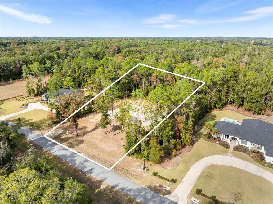 Last option to secure an opportunity to build your dream home in Wexford, one of Gainesville’s premier gated communities in SW Gainesville. This 1.41-acre estate homesite offers the rare chance to partner with AR Homes—Gainesville’s most sought-after luxury custom home builder—to create a residence tailored perfectly to your vision.

Set within a serene, established neighborhood and located in top-rated school zones, Wexford combines privacy, prestige, and convenience. Enjoy proximity to Tioga Town Center, Haile Market Square, HCA Hospital, and easy access to I-75—all just minutes away.

Experience effortless luxury living in a setting designed for those who value craftsmanship, space, and exclusivity. Your private oasis awaits.