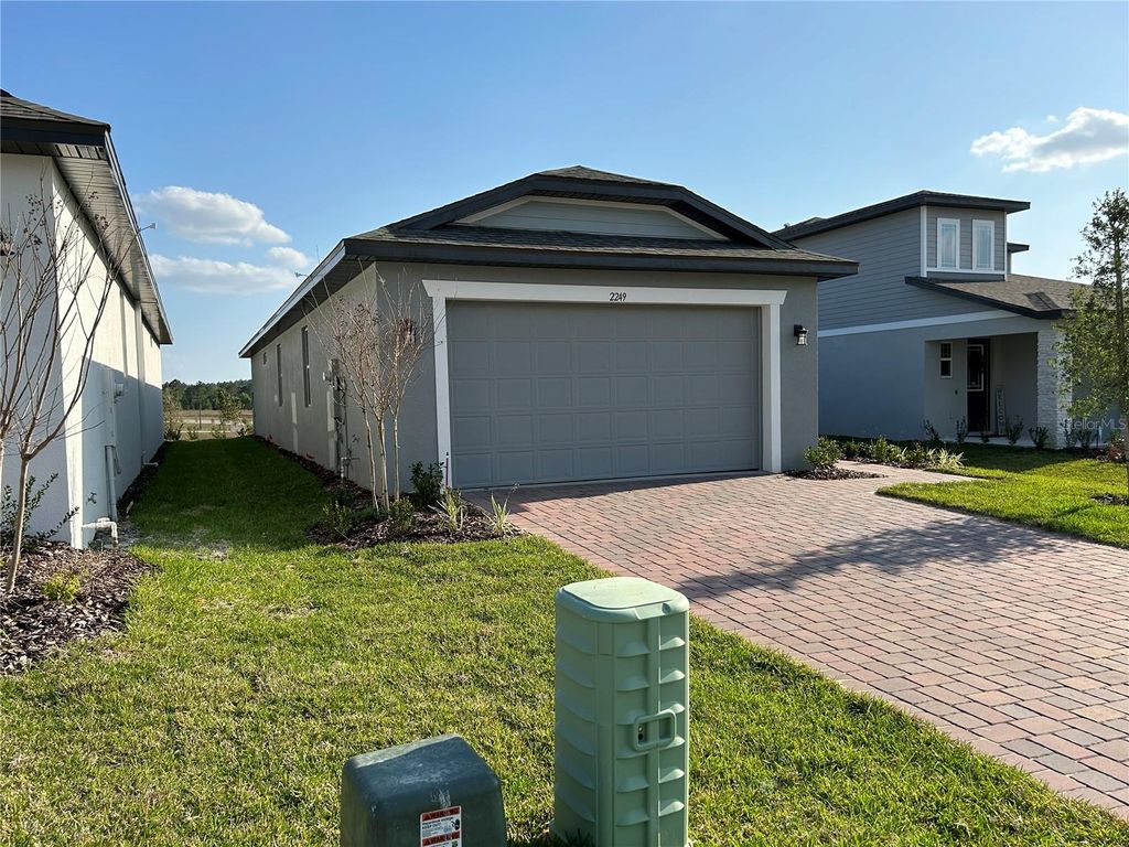 Photo of 2249 Mystic Maze Lane, Clermont, FL 34715 (MLS # O6413613)