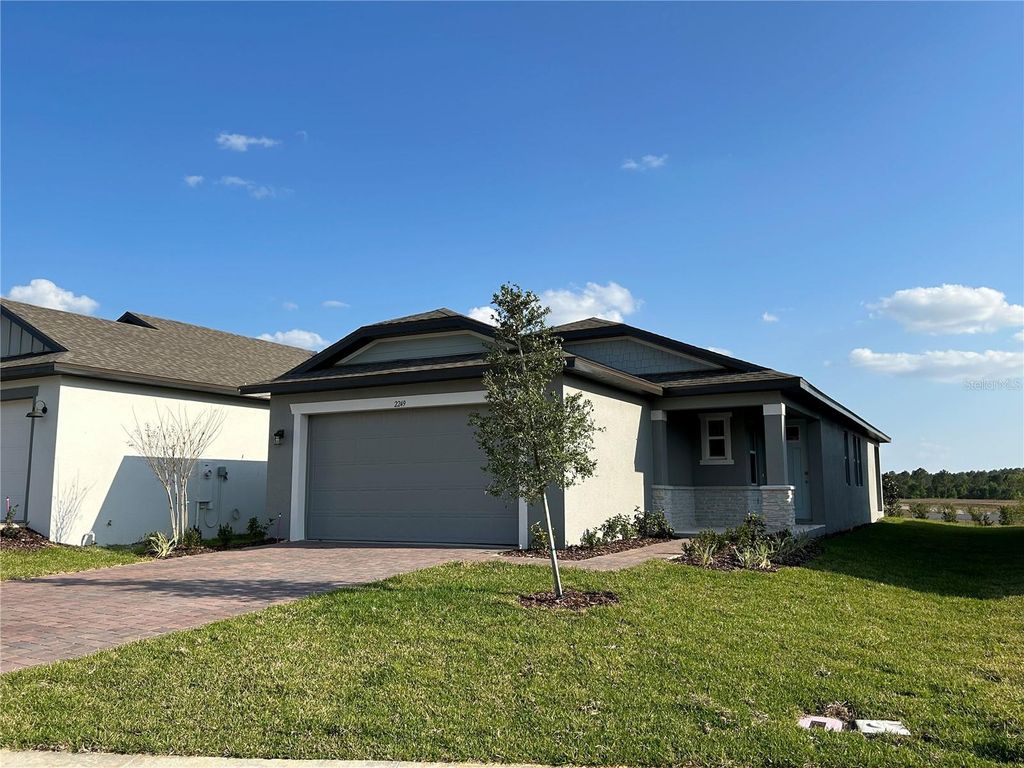 Photo of 2249 Mystic Maze Lane, Clermont, FL 34715 (MLS # O6413613)