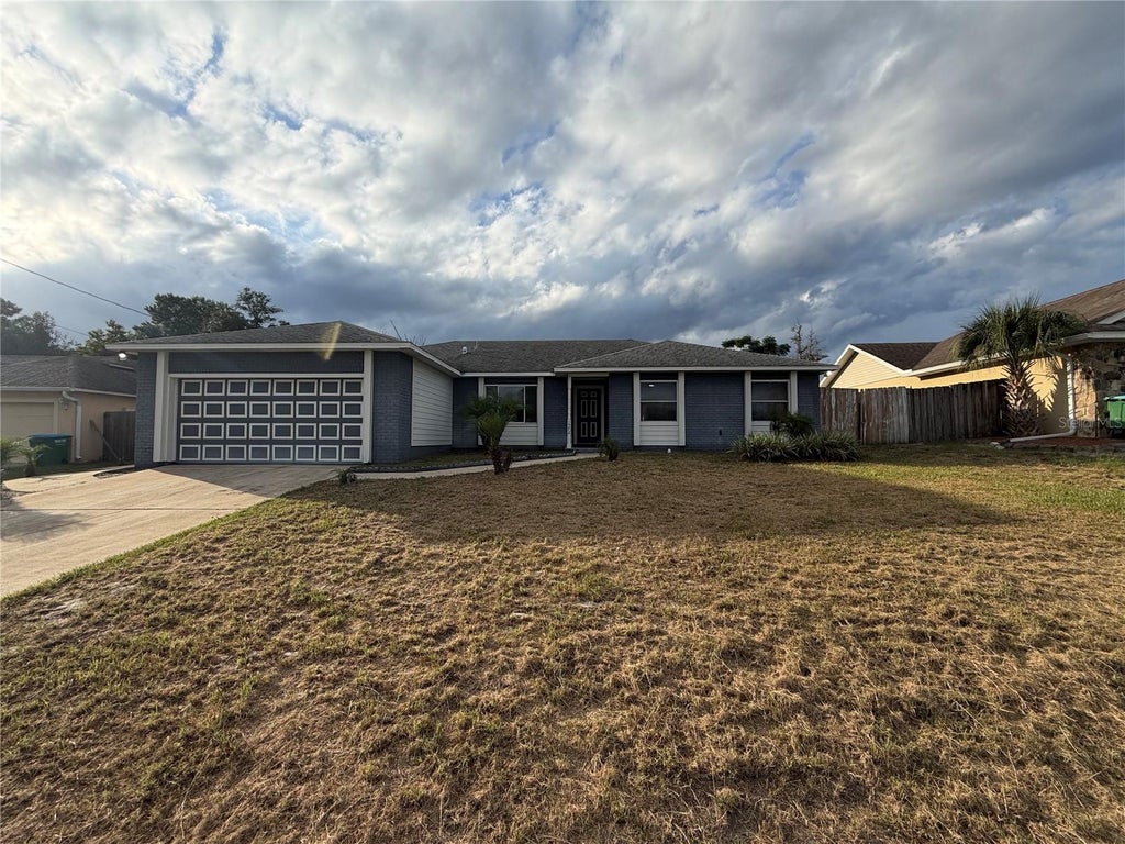 Photo of 1572 Deerfield Avenue, Deltona, FL 32725 (MLS # O6451599)