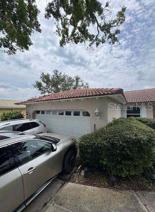 Photo of 2014 Tanglewood Way NE, St Petersburg, FL 33702 (MLS # TB8540159)