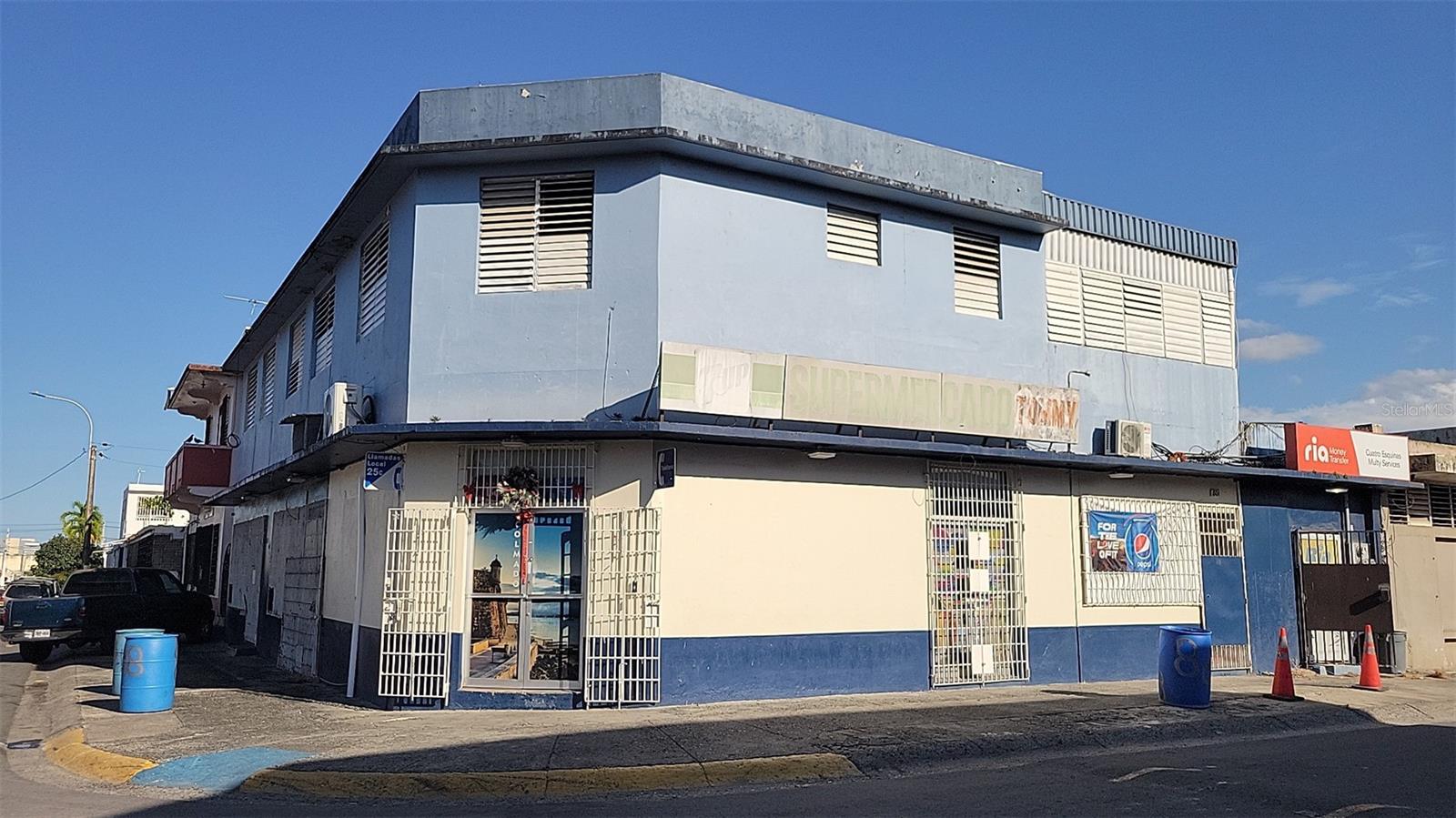 Corner commercial building in the metro area with easy access to main roads and walking distance to residential communiies and all type of business services. 1st story separate on 3 comercial locals Unit 1 storage 2,091 sqf, unit 2 market place 804 sqf, unit 3 money transfer local 252 sqf. 2nd story separate on 5 residential units, unit 1 2H 1B with 760 sqf, unit 2 1H 1B with 250 sqf , Unit 3 1H 1B with 310 sqf, Unit 4 1H 1B with 316 sqf, Unit 5 1h 1B with 467 sqf. Actually rented 3 commercial locals and one residential unit.