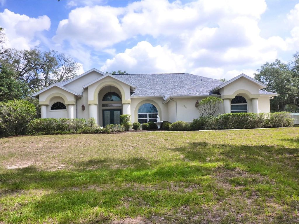 Photo of 12271 Centralia Rd, Weeki Wachee, FL 34614 (MLS # TB8388816)