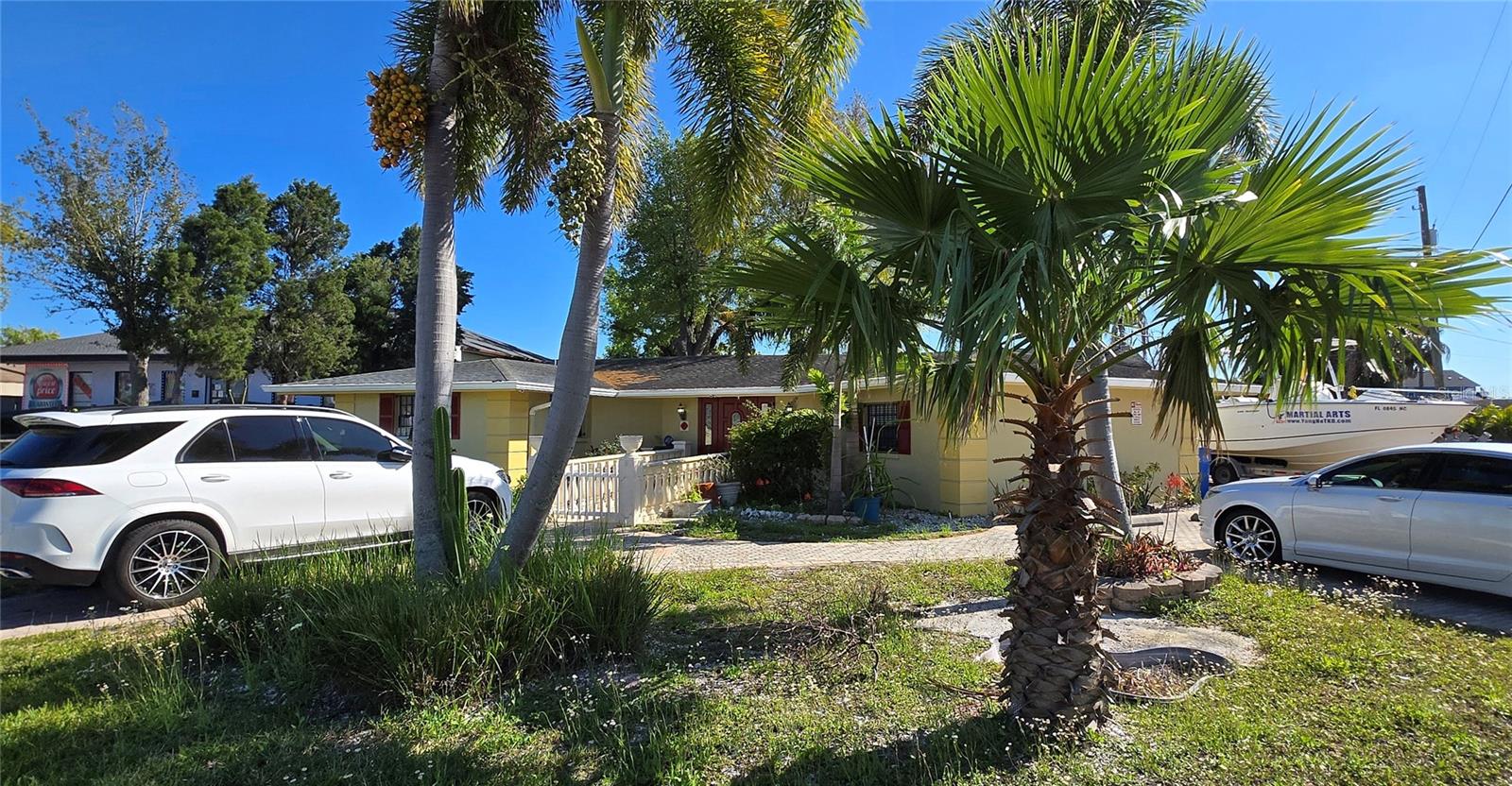 All drywalls are redone with the concrete enhancement. All new interior painting. It will be an excellent opportunity for the business owner to own property to be free of paying rent. This property is located at just West of W. Hillsborough Avenue and Memorial Highway with extremely high traffics. This property is also located at the corner lot with fenced backyard and brick paved parking lot. It feaures 4 rooms, 1 kitchen, large reception area, 2 bathrooms with shower in both bathrooms, large screened rear patio, and portable storage shed. The fenced backyard is large enough to park Boat or RV. Current sewer system is Septic Tank but if the buyer wants to connect to public sewer after purchase, the sewer line in Rocky Creek Drive is ready to be connected to this property.