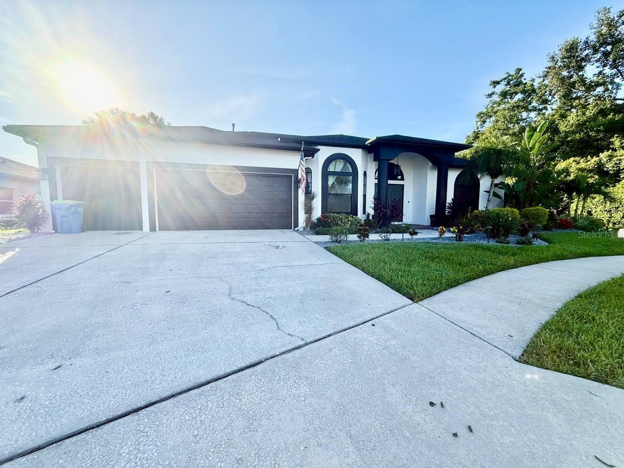 Welcome to this stunning and well-maintained gem located in the highly desirable Meadow Pointe community in Wesley Chapel. Featuring 4 spacious bedrooms, a dedicated office/flex space, 3 full bathrooms, a 3-car garage, and a sparkling private pool this home offers the perfect layout for comfortable living and entertaining. As you enter, you're greeted by a formal dining room and separate living area, setting the tone for this elegant and functional floorplan, along with soaring ceilings and custom light fixtures. The heart of the home is the gourmet kitchen, complete with black stainless steel appliances, double dishwasher, gas range with pot filler, subway tile backsplash, a large custom wood center island, extensive cabinetry, and a cozy breakfast nook all overlooking the bright and open family room. The primary suite is a true retreat, offering an en-suite bathroom and generous space for relaxation. Luxury vinyl planking and plush new carpet flow throughout the home, providing both comfort and durability. Step outside to your screened-in lanai and enjoy the Florida lifestyle year-round in your private pool and outdoor entertaining area perfect for gatherings or quiet mornings. Tesla electric charger and an entire home generator are installed. Laundry room has utility sink, additional storage cabinets and washer are dryer included. Amazing amenities include a community pool, fitness center, tennis courts, playground, and clubhouse. Located in a top-rated school district and a vibrant, close to shopping, dining, parks, and major highways, this home truly has it all. Don't miss this exceptional opportunity schedule your private tour today! In addition to the advertised base rent, all residents are enrolled in the Resident Benefits Package (RBP) for $50.00/month which includes HVAC air filter delivery, credit building to help boost your credit score with timely rent payments, utility concierge service making utility connection a breeze during your move-in, and much more! More details upon application. Pool care and lawn care are included in rent. Pets welcome, max 2. Vacant and Available now!