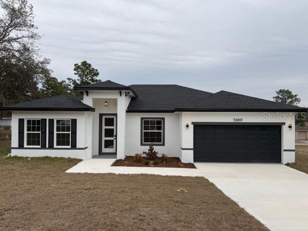 Photo of 5669 N Claremont Drive, Citrus Springs, FL 34434 (MLS # O6380209)