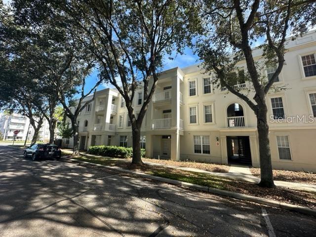 1 Bedroom Top Floor Condo at Siena in Celebration . Open floor plan with Living Room/Dining Room combo. New Luxury vinyl floors just installed in Livingroom and Bedroom, Freshly painted and new light fixtures. New Refrigerator just installed. Large balcony overlooking Siena Park. Master has Walk in Closet and Bathroom has large Soaking Tub. Short walk to Siena Clubhouse with Fitness center and Pool. Conveniently located close to all major Theme Parks, Restaurants and Shopping. New Luxury Vinyl Floors being installed in the living/Dinning room and Bedroom. Reserved parking space #72 included.