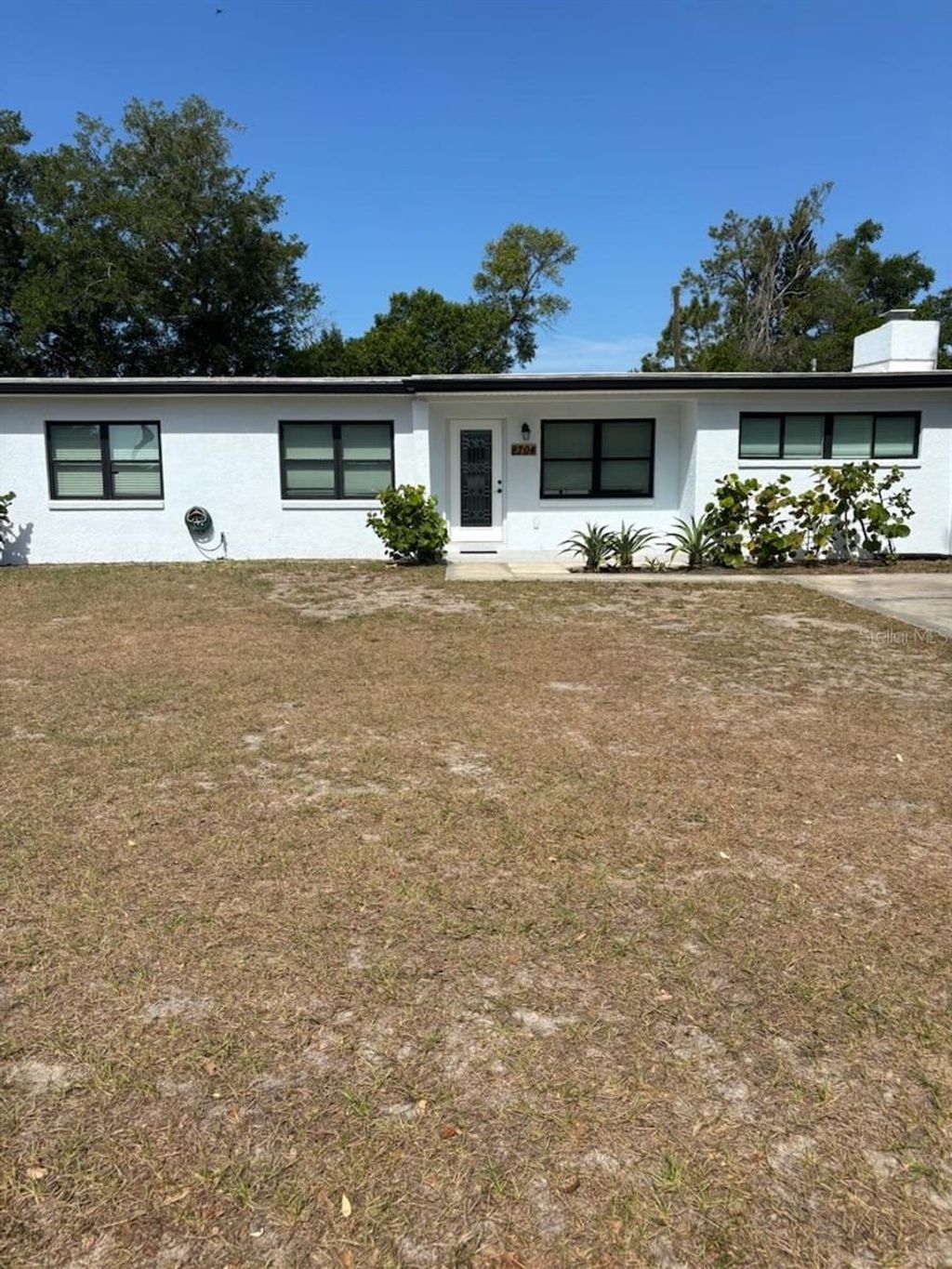 Photo of 8704 N Renfrew Place, Tampa, FL 33604 (MLS # TB8504539)
