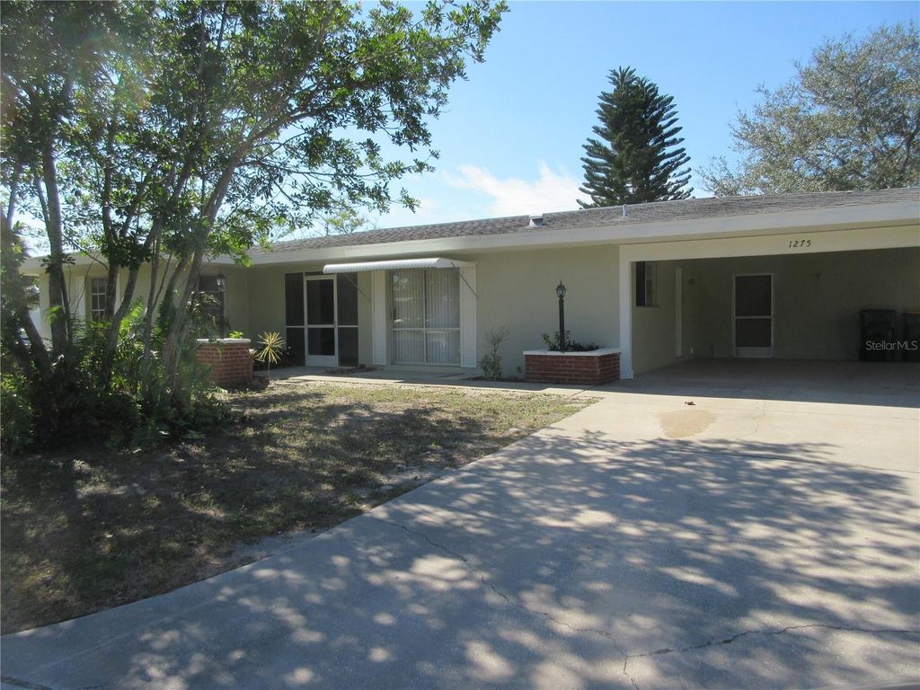 Photo of 1275 Price Circle NW, Port Charlotte, FL 33948 (MLS # C7522868)