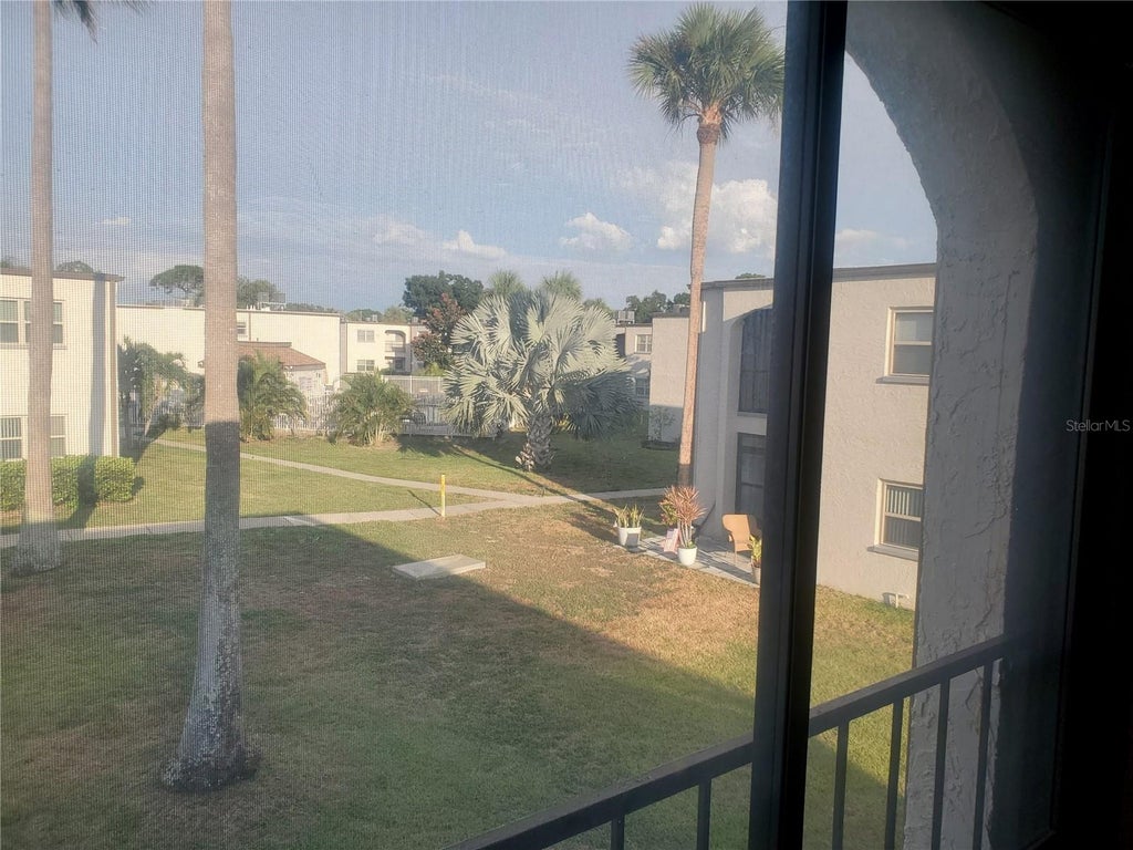 Photo of 7701 Starkey Road #316, Seminole, FL 33777 (MLS # TB8525566)