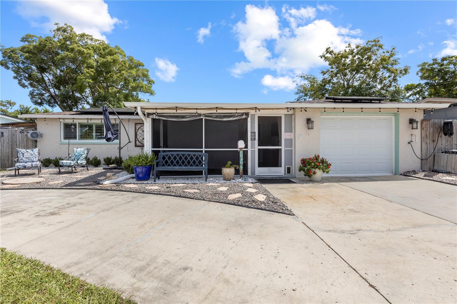 Discover this beautifully maintained 3-bedroom, 2-bathroom single-family home in the heart of New Port Richey. Designed with efficiency and convenience in mind, this home features paid-off solar panels that keep the electric bill at just ~$35/month, a new upgraded electric service panel, a newer HVAC (2019), roof (2018), and storm impact windows for lasting peace of mind. The plumbing has been upgraded to current building materials and functionality.
Inside, the upgraded kitchen and bathrooms showcase granite countertops, custom finishes, and modern touches throughout. A thoughtful addition provides a huge walk-in closet in the primary suite and a spacious walk-in pantry off the kitchen, creating both style and functionality. The home also features plantation shutters, which highlight the abundant natural light and further add to the home’s appeal!.
The above-ground pool has been integrated seamlessly into the backyard, providing a cool oasis on a sunny day. A circular driveway ensures ample parking for you and your guests and the golf cart carport provides a space for your smaller vehicles. The home's enhanced landscape includes customized drainage and a communal area in the front yard.
Perfectly located around the corner from Gulf High School and a local fire station, the home also offers quick access to downtown New Port Richey, shops, dining, Gulf beaches, and the scenic Pithlachascotee River.
Move-in ready and filled with smart upgrades, this home is the perfect blend of comfort, convenience, and long-term value.