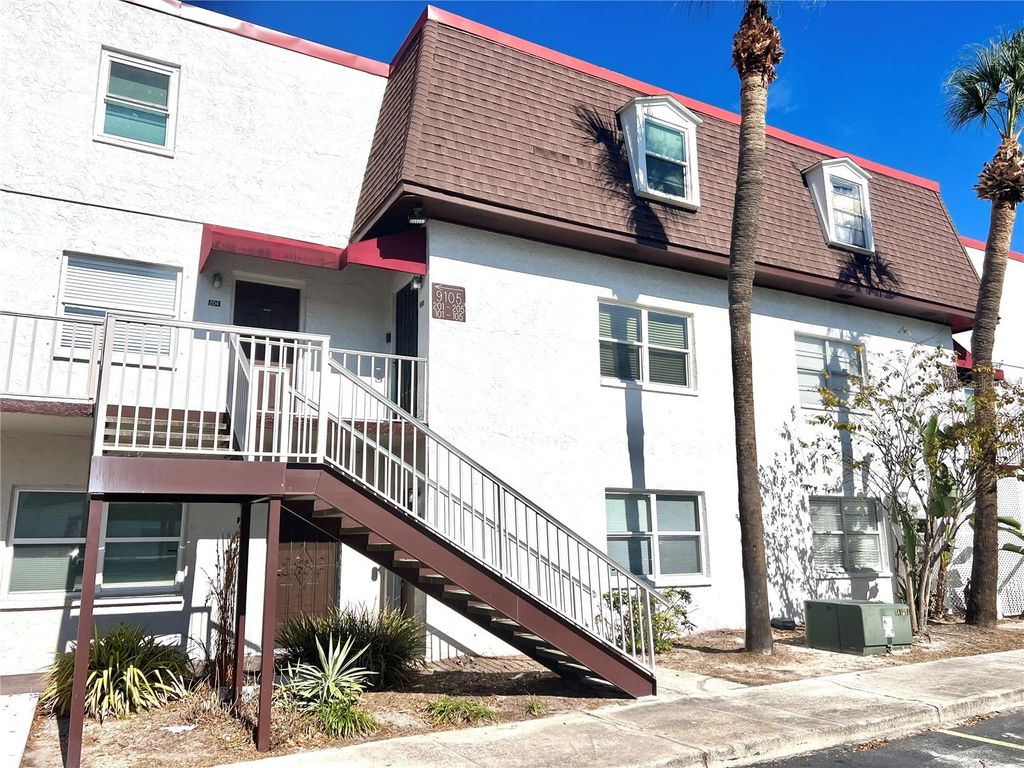 Photo of 9105 Tudor Drive #F105, Tampa, FL 33615 (MLS # TB8456901)