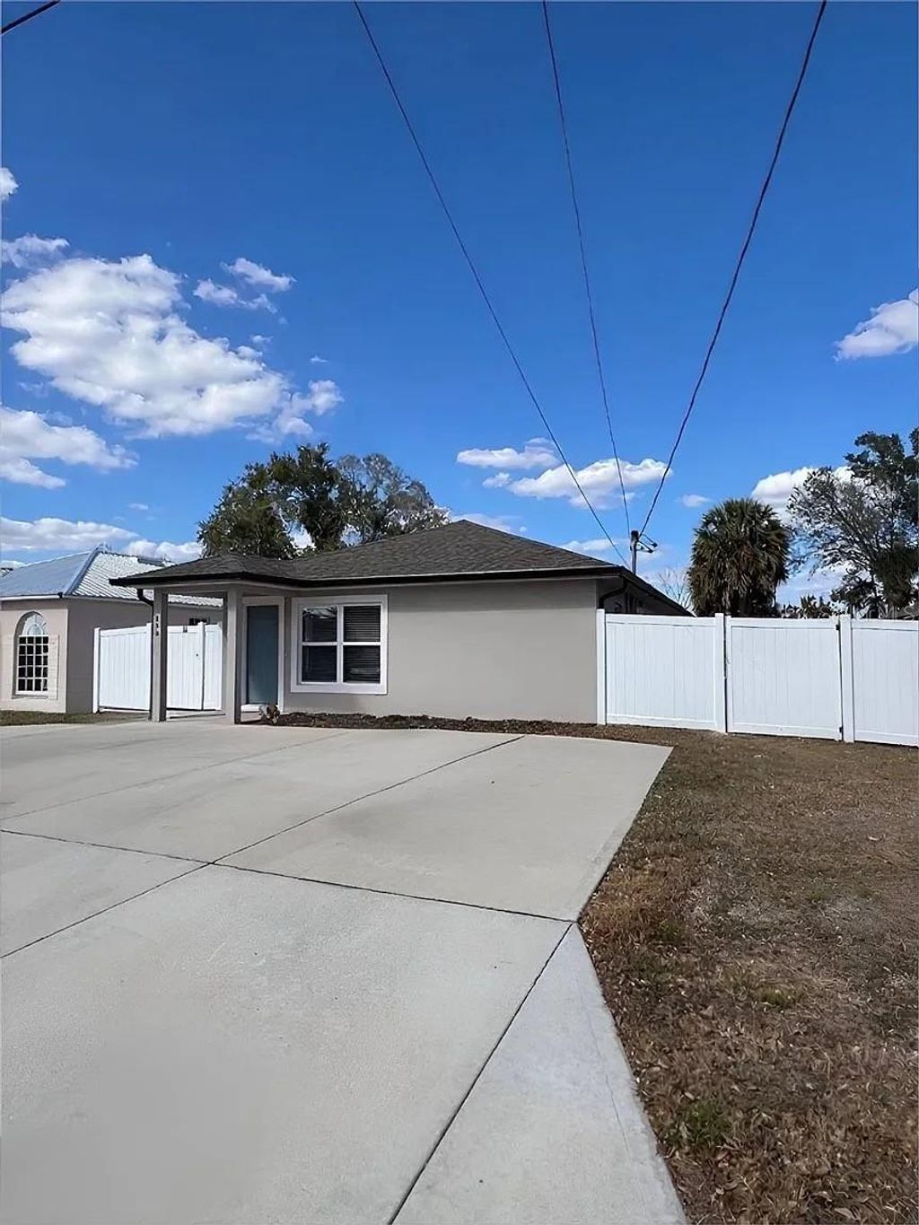 Photo of 650 E Grapefruit Avenue, Lake Alfred, FL 33850 (MLS # O6390539)