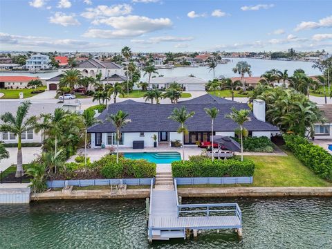 Photo of 221 Howard Drive, Belleair Beach, FL 33786 (MLS # TB8446537)