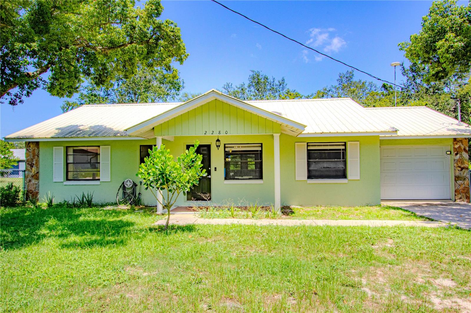 Charming & Affordable 2-Bedroom Home in Quiet Avon Park Neighborhood
Discover this well-priced 2-bedroom, 2-bath home just minutes from the main highway, perfectly positioned in a peaceful and welcoming neighborhood. Step inside to find a spacious layout featuring a large master suite complete with a generous walk-in closet.
The home boasts several desirable upgrades, including tile flooring throughout the main areas, a stylish granite countertop in the kitchen, stainless steel appliances, and a ceiling fan in the living room for added comfort.
Enjoy year-round living in the enclosed and climate-controlled back porch, ideal as a sunroom, home gym, or casual lounge. Accessible via sliding glass doors from both the kitchen and main living area, this versatile space enhances both relaxation and functionality.
Outdoors, the fenced backyard is a true gem, filled with an assortment of fruit trees—including mango, peach, lemon, orange, and tangerine. There’s also a side yard perfect for boat parking and plenty of room for pets to roam safely.
Out front, you'll find a cozy porch just right for enjoying your morning coffee, along with a private driveway leading to a single-car garage.
This home blends comfort, convenience, and charm—don’t miss your chance to make it yours!
