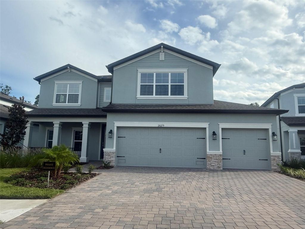 Photo of 20279 Oriana Loop, Land O Lakes, FL 34638 (MLS # J990323)