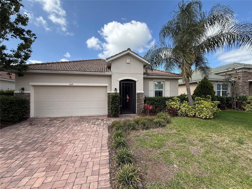 Welcome to Gated Stoneybrook at Venice! This home built in 2018 features 4 bedrooms, 2 bathrooms, a 2-car garage and 1668 square feet! At the main entry doorway, step to the left and find the secondary bedrooms sharing a full bathroom. Continue down the hall, step into the open concept floorplan that marries the kitchen, family and dining rooms togehter perfectly. The handsome kitchen has modern white cabinets, island, stainless-steel appliances and closet pantry. Sliding doors lead out to an oversized screened lanai with pond views. Directly off the kitchen, find the Primary Suite with walk in closet, dual sinks, soaking tub and step in shower. Great central location close to shopping, restaurants and interstate. It's good to be home! This property may qualify for Seller Financing (Vendee).