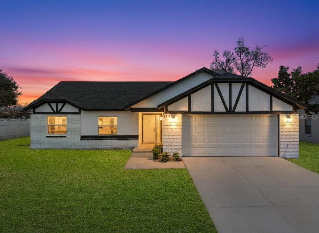 Photo of 6911 Crescent Ridge Road, Orlando, FL 32810 (MLS # O6385985)