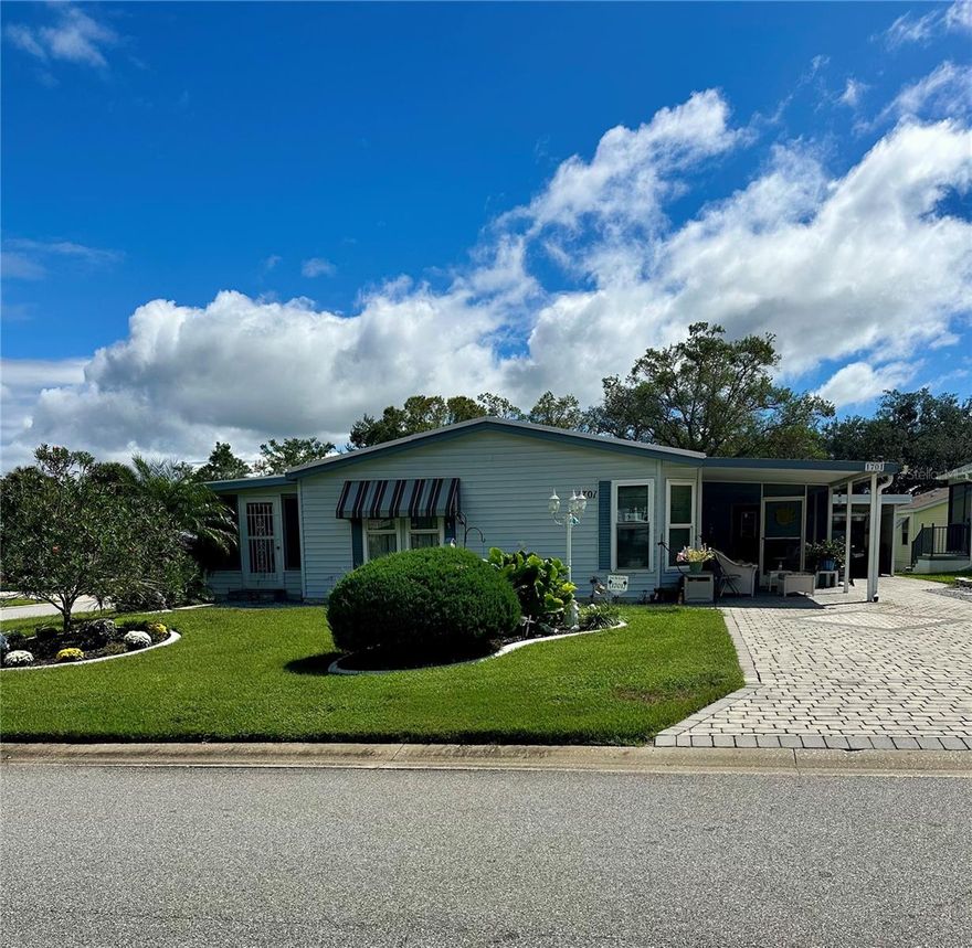 New Listing.  No Bond - No CDD.  Located in the beautiful historic area of The Villages - Country Club Hills, near Orange Blossom Country Club.  Lovely 2 bedroom- 2 bath home sitting on well-maintained large corner lot and on a cul-de-sac street.  The kitchen is updated with granite countertops, the roof is membrane, there are newer windows thru-out the home and there are pavers on the two car wide driveway. For relaxing, there is a Florida room and also a screened lanai. This is a beautiful cared for home - a must see,