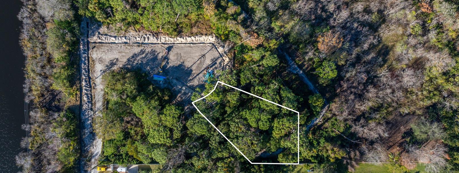 Pre-Development Opportunity is at Your Door! Build your dream home on the largest buildable lot in what will soon be the exclusive community of The Estates at Eniswood. Nestled in the heart of highly desirable Palm Harbor, this vacant lot offers the chance to create your perfect home while enjoying access to some of the top-rated schools in the area. The Estates at Eniswood is a boutique private community consisting of just seven homesites, surrounded by the established neighborhoods of Eniswood and Autumn Woods. With the subdivision plat already filed (January 2024) and a developer bond in place to guarantee the development of infrastructure, roads, and utilities, you can rest assured your future community will be thoughtfully designed and executed.This exclusive opportunity allows you to build in a private seven-lot community where homes must have a minimum living area of 2,000 sq. ft. Buyers have the flexibility to choose between the developer’s builder or bring their own builder to craft a custom vision. This lot offers endless possibilities to design the home of your dreams while enjoying a prestigious Palm Harbor location near schools, shopping, dining, and entertainment. Don’t miss this rare opportunity to secure your spot in this one-of-a-kind community. Act now to make your dream a reality! Contact us for more information today.