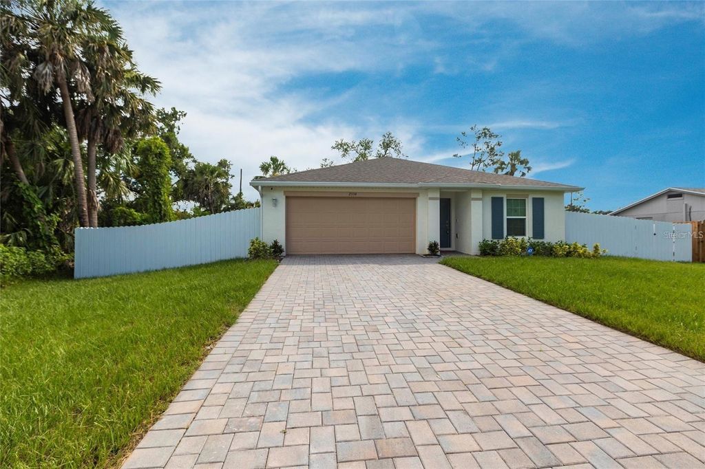 Photo of 2554 Lakeshore Circle, Port Charlotte, FL 33952 (MLS # O6356650)