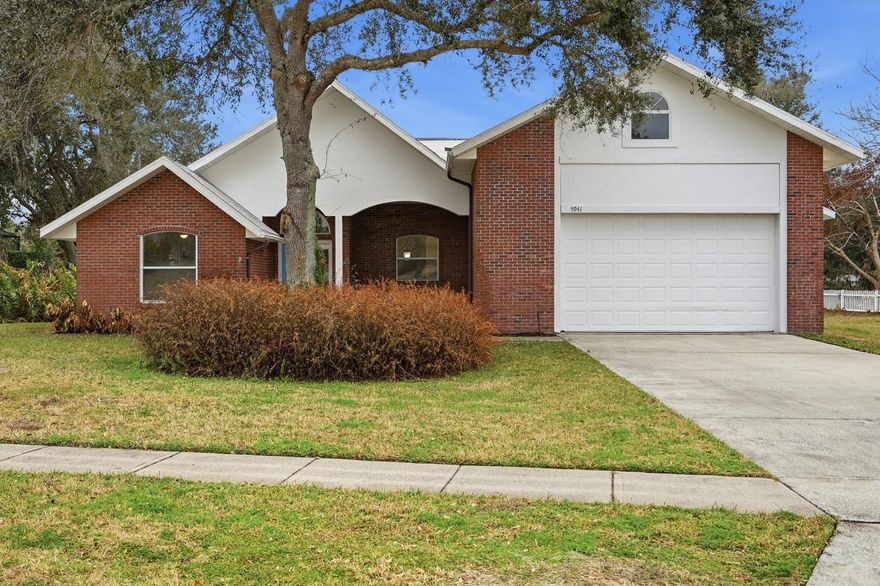 This is a lovely 3 bedroom 2 bathroom home with a screen enclosed porch overlooking  beautiful Sky Lake. The entire home has recently been painted (interior/exterior) and new flooring was installed. This home is one of the most unique in the area due to its construction and versatile garage. If you are someone who wants a smaller home with room for their RV or boat you have come to the right place. Why buy a house with acreage that you have to take care of when what you really want is a beautiful house with a great view and a very large garage to store your RV, boat or car collection. The ceiling height in the garage is 13 feet 7 inches and the garage is 60’ deep. The 2 car garage door will open up to allow parking a full size recreational vehicle or boat. Have a lot of cars? You should be able to fit over 7 cars in the garage. There is even a bonus floored area, in the garage, above which is 10’ x 20’ for storage. The construction quality is second to none. The property is constructed of Insulted Concrete Forms (ICF). It is reinforced with rebar and then solid poured concrete. Not only is it extremely safe from hurricanes but it is energy efficient. One last additional feature…. the home is solar powered and the panels are fully owned.  Enjoy extremely low electric bills. A home with these amenities in a beautiful neighborhood is very rare. Call for a showing today!