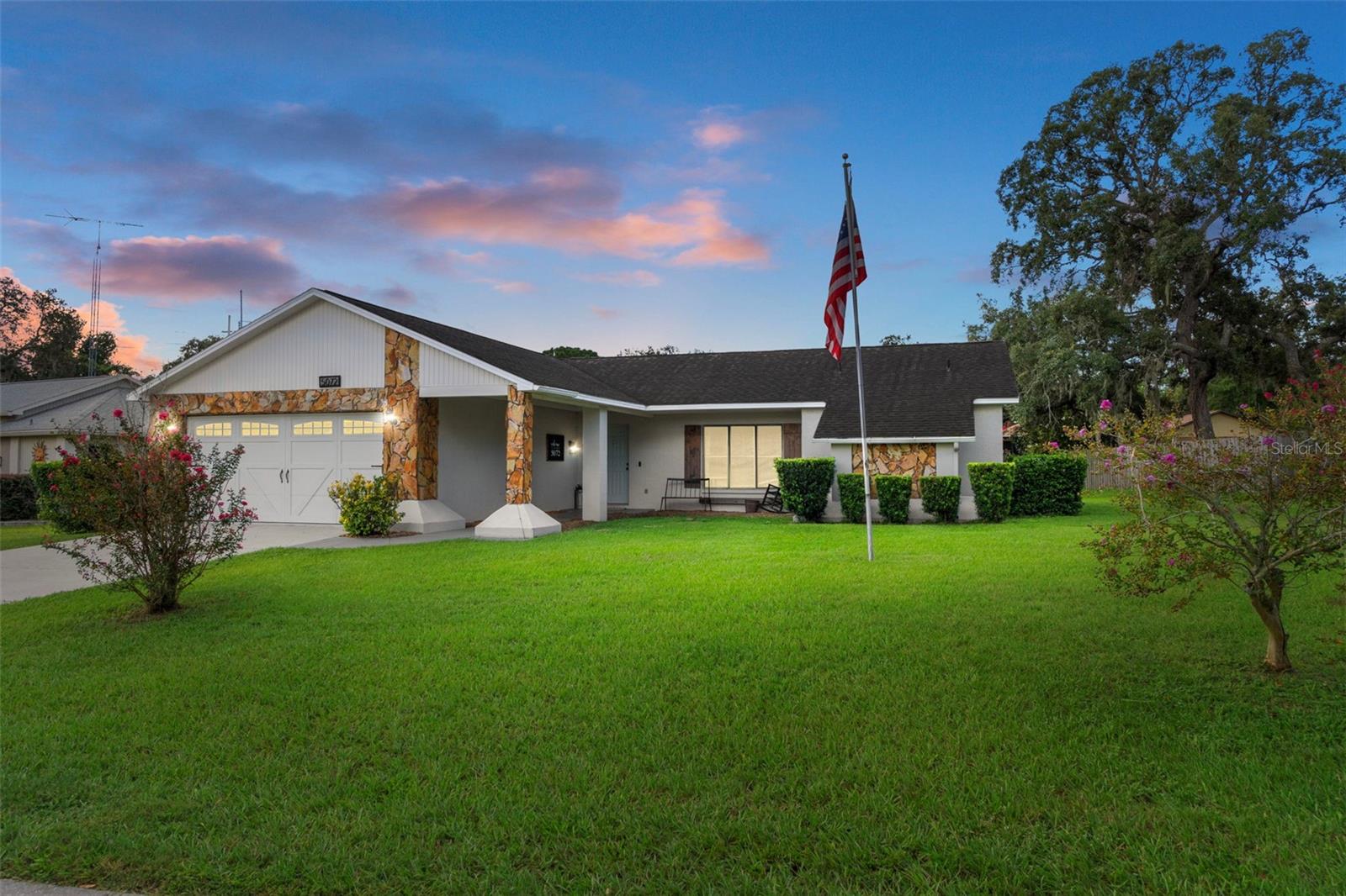 This charming 2-bedroom, 2-bath home is situated in the adorable neighborhood of Crystal Oaks, one of Citrus County's best-kept secrets. The home exudes warmth and comfort throughout. Home has been updated with tasteful features including a batten board look, shiplap board, and recessed lighting over the coffee bar & throughout the kitchen. Easy-to-maintain luxury vinyl flooring flows throughout the home. The primary bathroom has been completely renovated and includes a walk-in shower with timeless marble look octagon tile, new vanity, lighting & mirror accenting the remodel. On the other side of the home is the second bedroom with a batten board design decor wall. The second bathroom has a warm wood ceiling accenting the wood-framed vanity mirror. The decor and detailed accents in this home make it exceptionally inviting. Storage is abundant, with plenty of closet space available throughout. This home offers a split floor plan and is truly move-in ready. You can relax on the screened back porch while enjoying your fenced-in backyard. Don't be misled by the square footage; the layout makes this home feel incredibly spacious. If you decide to become a member of the civic association, you will also enjoy the use of the pool and clubhouse activities, such as Bingo and dinners, for an additional fee. Other amenities included are corn-hole, horseshoes, and shuffleboard. The optional Civic Association Fee is $238.50 per year. There's also the availability of a fenced lot to store your boat or RV for $150.00 per year.