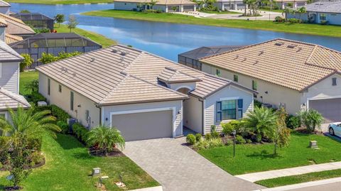 Photo of 5317 Coral Reef Way, Bradenton, FL 34211 (MLS # A4642489)